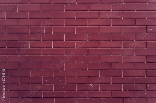 Plain bright red brick wall
