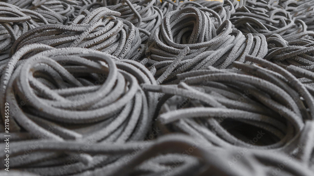 texture with raw black pasta. Copy space texture with raw black pasta. Copy space