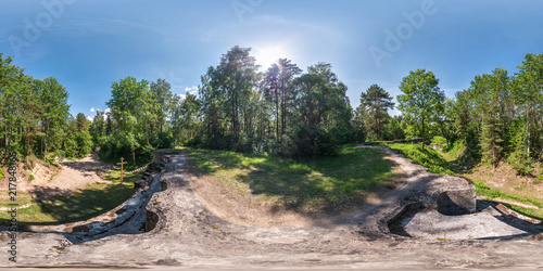 full seamless panorama 360 by 180 degrees angle view on top ruined abandoned military fortress of the First World War in forest in equirectangular spherical equidistant projection