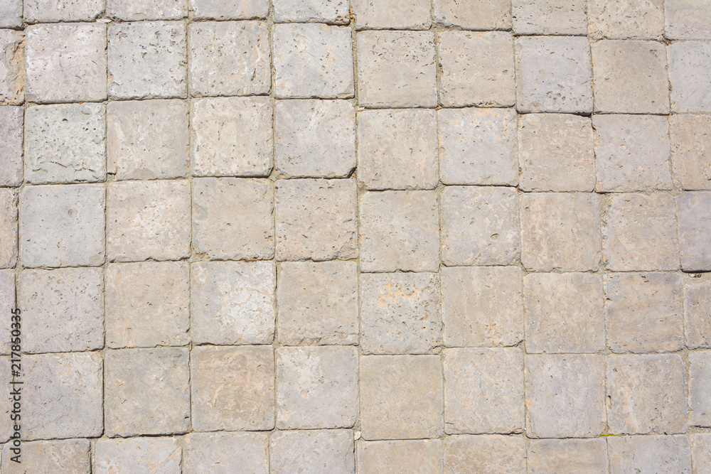 background of square granite stone. path paved with grey paving background of square granite stone. path paved with grey paving