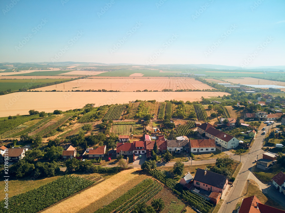 Aerial view of landscape with houses roofs and fields, Czech Republic