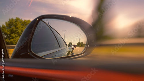 Looking through the mirror, street racers view, transportation backgrounds © Dmytro Tolokonov