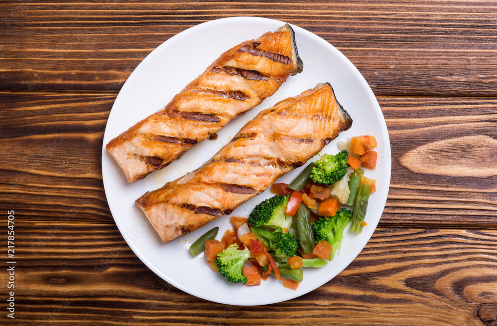 Grilled salmon fish with vegetables