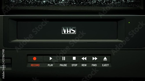 VHS tape being inserted into VCR animation pack. Featuring different labels for home movie, wedding, vacation, memories and road trip. photo