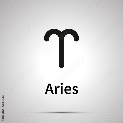 Aries astronomical sign, simple black icon with shadow on gray