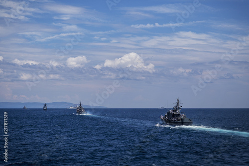 Group of ships during training in the Black Sea/Bulgaria/07.19.2018/ Military ships on water Editorial use only. A parade of warships against the background of a beautiful sky.