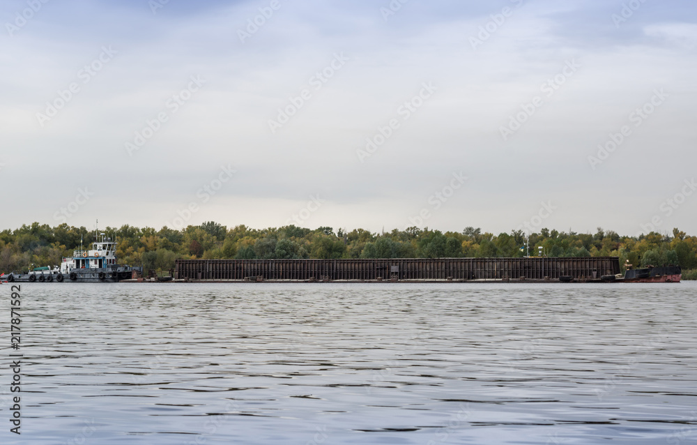 A dry cargo ship sails along the Dnieper River A dry cargo ship sails along the Dnieper River