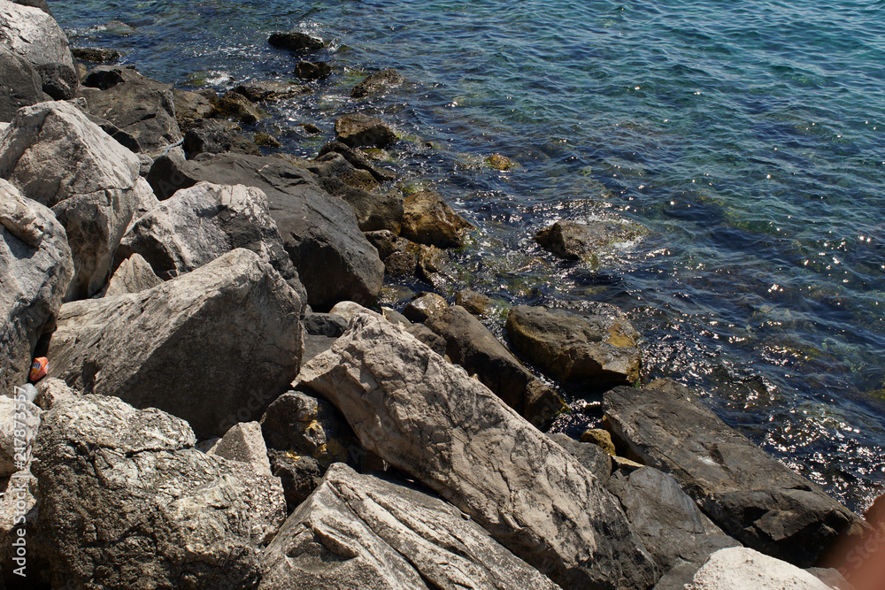 Rocky bay with giant boulders daytime Rocky bay with giant boulders daytime