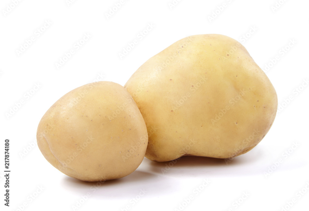 Two fresh potatoes isolated on white background. Two fresh potatoes isolated on white background.