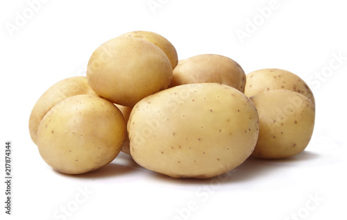 A heap or fresh potatoes isolated on white background.