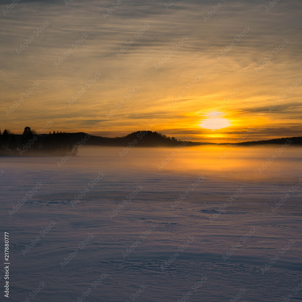 Sunset in snow fog Sunset in snow fog