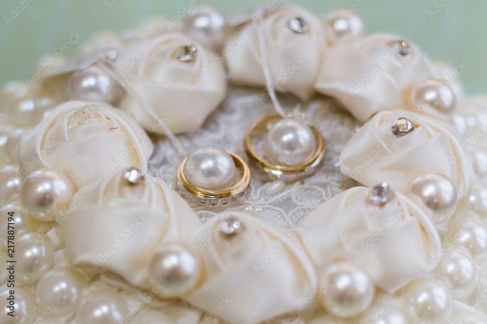 Wedding rings on a beautiful stand closeup Wedding rings on a beautiful stand closeup