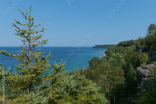 Bright beautiful landscape of Niagara Escarpment limestone cliffs along lake huron