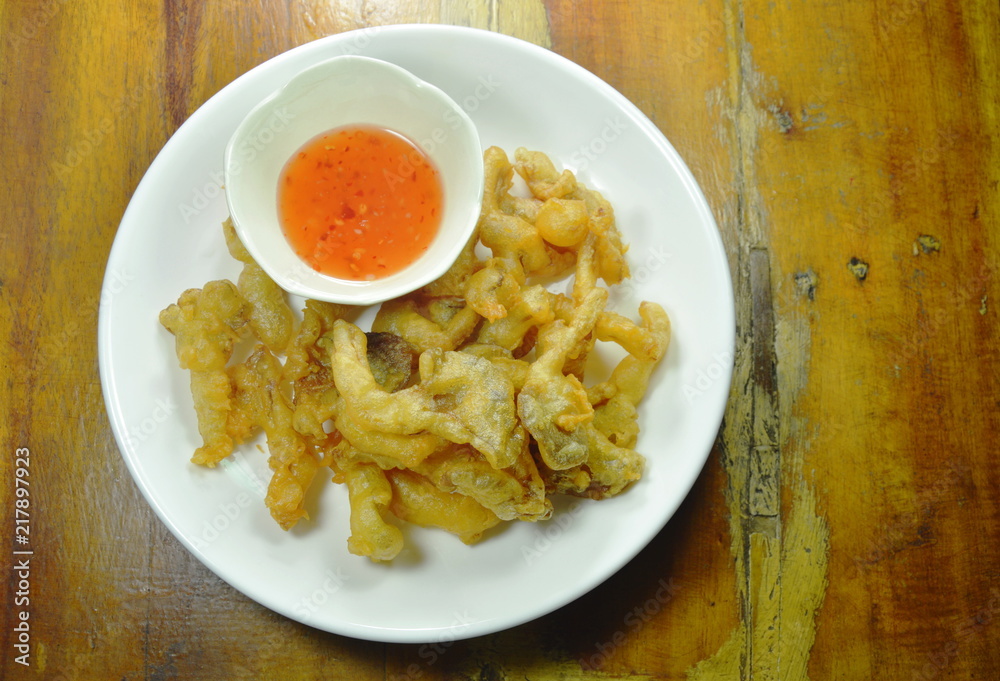 crispy batter-fried oyster mushroom with flour dipping sweet chili sauce