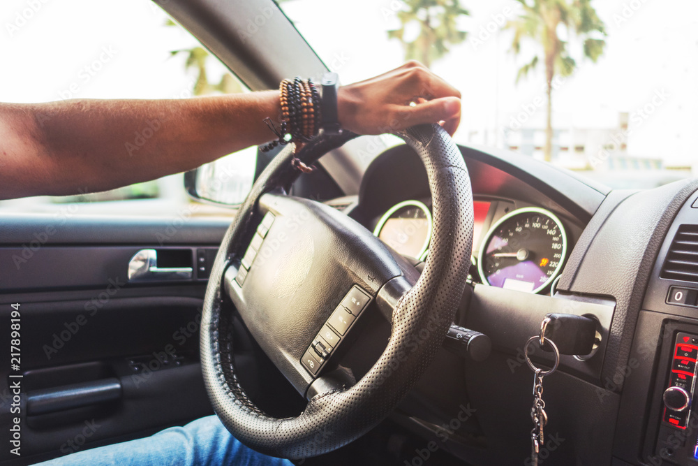 interior view of a man driving his car interior view of a man driving his car