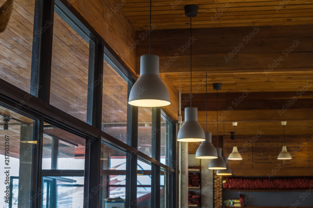 Suspended ceiling lamp sorted in a row, vintage style.