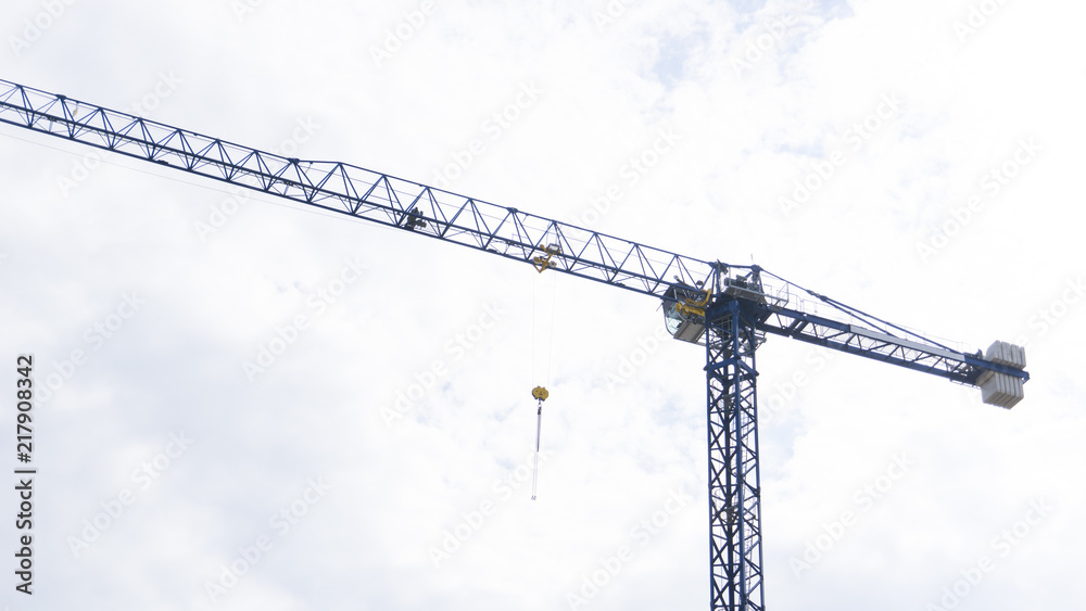 Crane / Cranes on Blue Sky With Clouds for Construction Advertising Design 