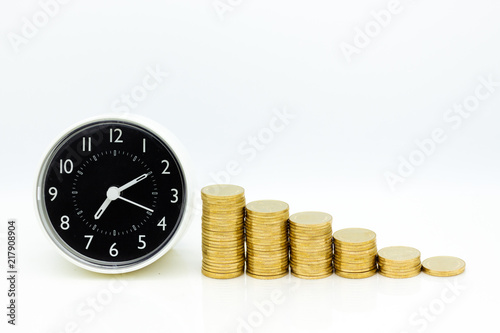 Pocket watch and stack of coins. Image use for sale background, buy, trade, deal, business time concept.