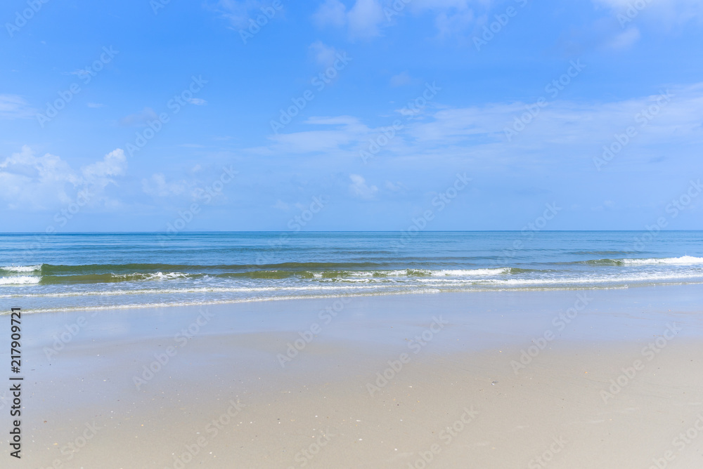 Landscape of Sea sand with Blue sky and cloud on the beach.