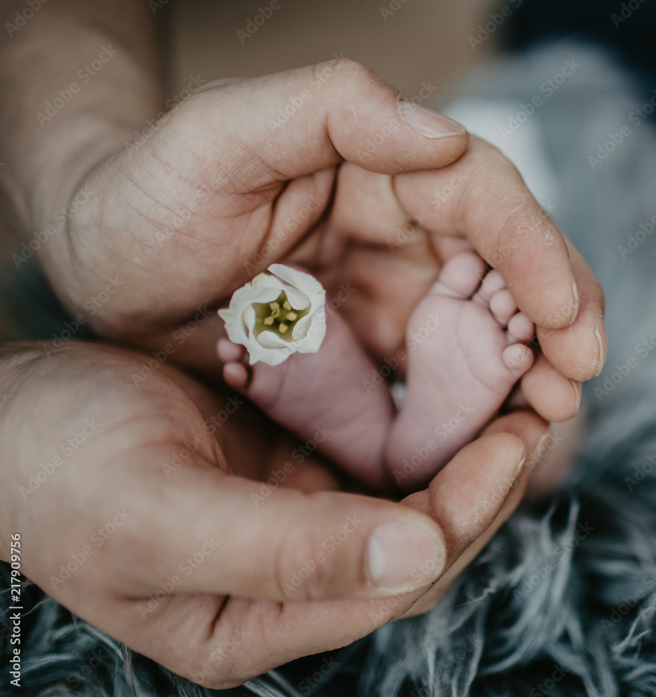 Babyfüsse in hand Babyfüsse in hand
