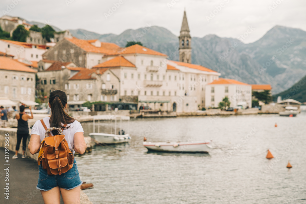 beautiful view of Perast town in Montenegro. woman standing in front