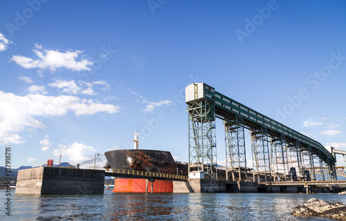 Large cargo ship stationed at a grain terminal in Vancouver. © Adam