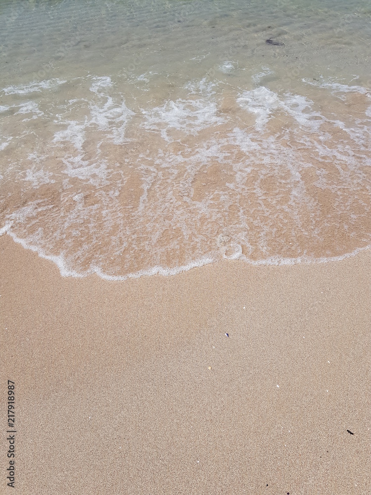 blue clear water and white sand on a sunny day blue clear water and white sand on a sunny day