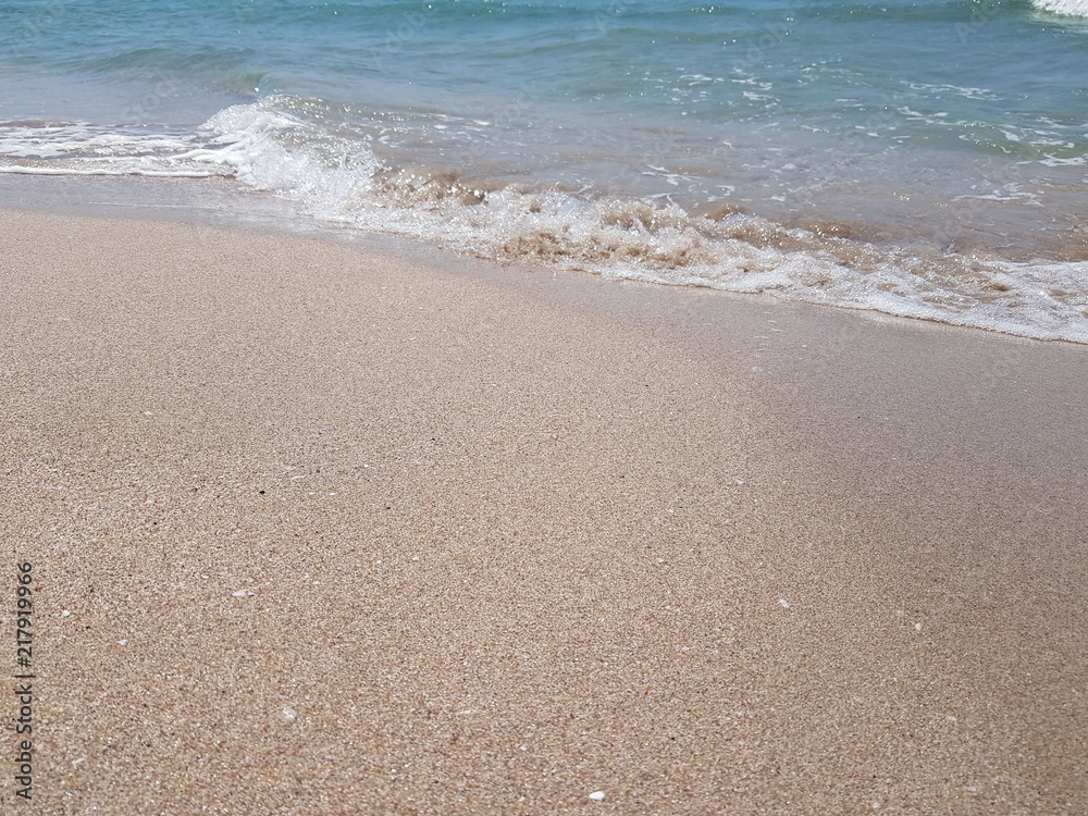 blue clear water and white sand on a sunny day blue clear water and white sand on a sunny day