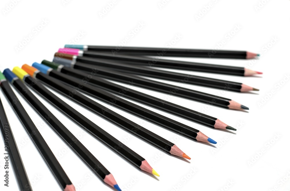 Back to school concept-close up of colored crayons on a white background. Back to school concept-close up of colored crayons on a white background.