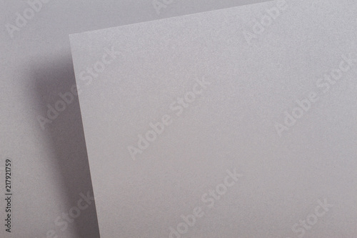 Abstract geometric shape gray color paper background photo