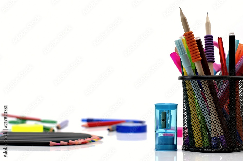 Back to school concept-close up of school supplies on a white background. Back to school concept-close up of school supplies on a white background.