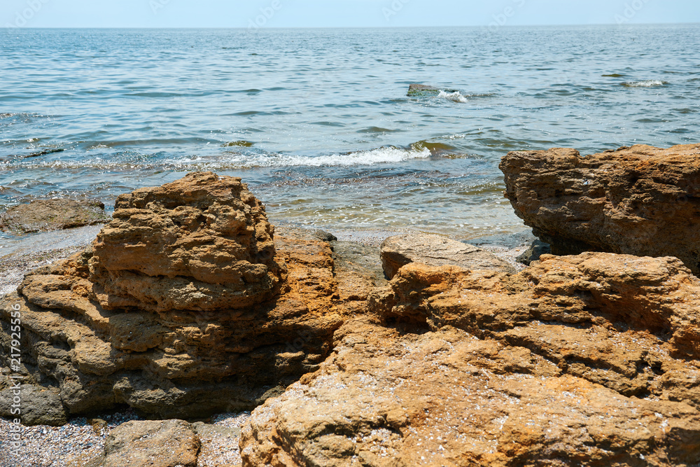 stones on the beach, beautiful sea summer landscape, wild beach closeup