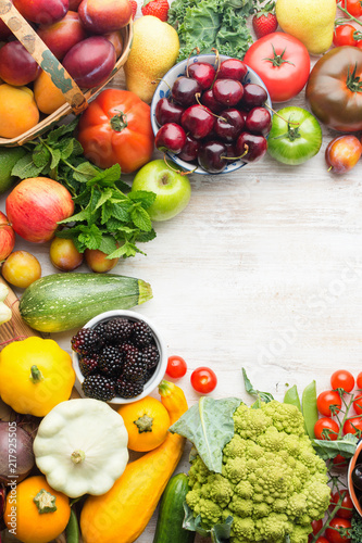Fototapeta Naklejka Na Ścianę i Meble -  Healthy eating, summer fruits vegetables berries, cherries peaches broccoli squash tomatoes plums beans beetroot, copy space, top view, vertical, selective focus
