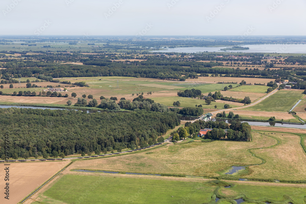 Aerial view Dutch polder Noordoostpolder with woods en agricultural landscape