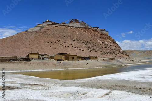 China, Tibet, Chiu Gompa monastery on a hill on the shore of lake Manasarovar photo