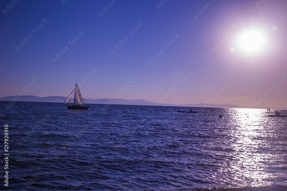 boat, sea, sailing, sailboat, sail, yacht, water, ocean, ship, blue, sky, sunset, horizon, travel, summer, yachting, nautical, sails, cruise, wind, sport, vessel, vacation, leisure, sun