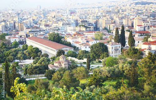 cityscape of Athens Greece as seen from Acropolis - the ancient Stoa of Attalos and an old church view
