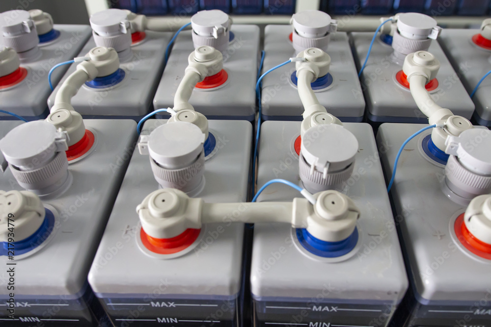 Rows of batteries in industrial backup power system. Battery pack in battery room in power plant. Supply electricity in plant during shutdown phase