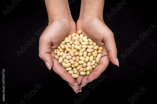 woman's hands with different cereals