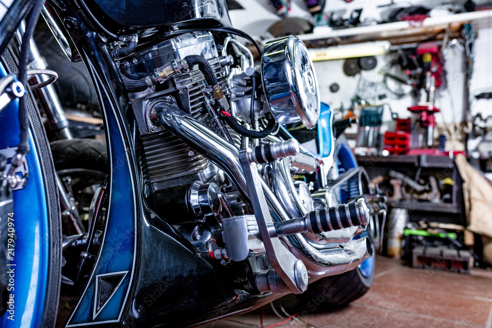 Detail on a modern motorcycle in the workshope. Motorcycle Exhaust. selective focus Detail on a modern motorcycle in the workshope. Motorcycle Exhaust. selective focus
