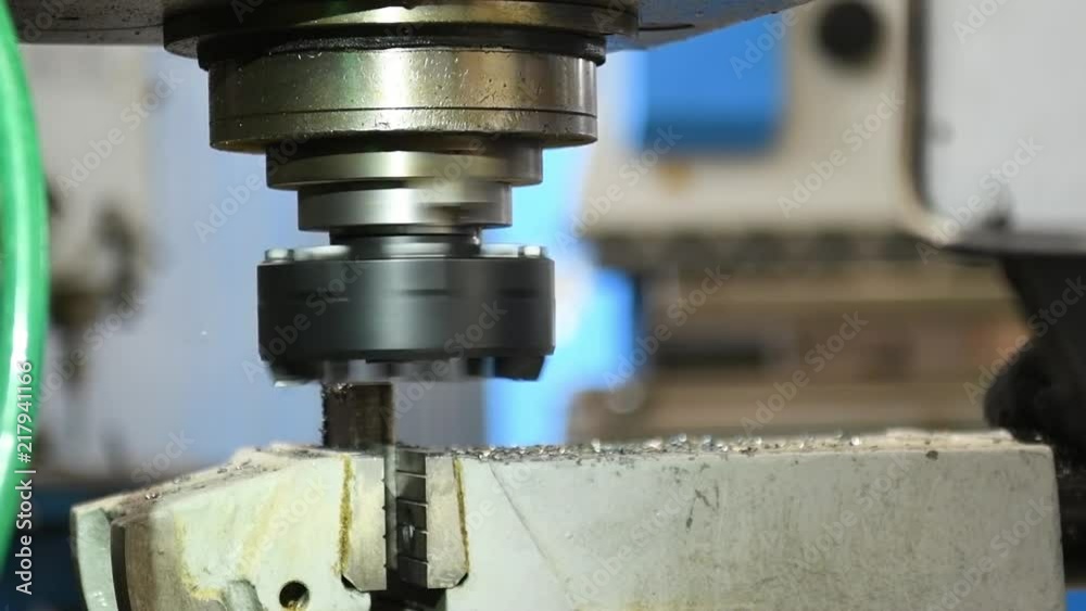 Metal machining. Mill cutting detail on milling machine. Metal machining. Mill cutting detail on milling machine.
