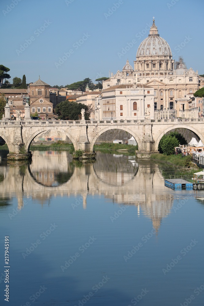 View to Vatican city and Statue of Ponte Vittorio Emanuele II in Rome, Italy 