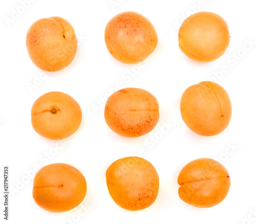Apricot fruits isolated on white background. Top view. Flat lay pattern. Set or collection