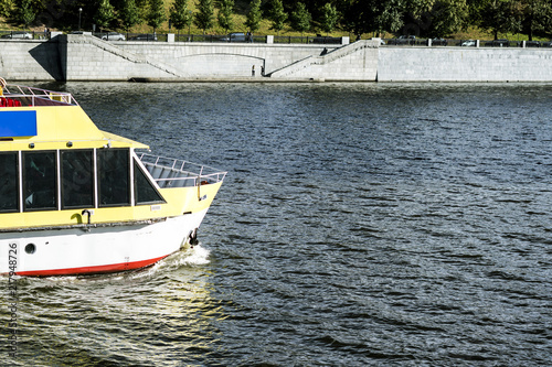 close up detailed shot of passenger cruise ferry ship in the city river photo