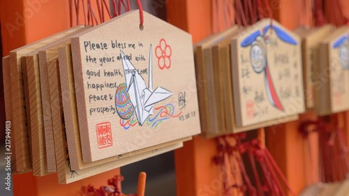 Wallpaper Mural Wishing Wooden tag with blessing text from people and tourist on red wooden pole at fushimi inari shrine, Kyoto, Japan Torontodigital.ca