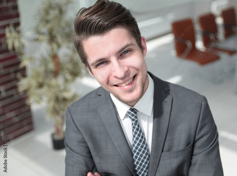 closeup.the face of a successful young man closeup.the face of a successful young man