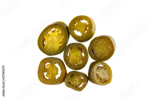 A few slices of hot jalapeno pepper. Marinated green pepper on a white background.