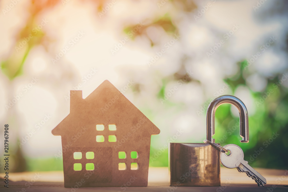 Real estate agent with house model and keys Real estate agent with house model and keys