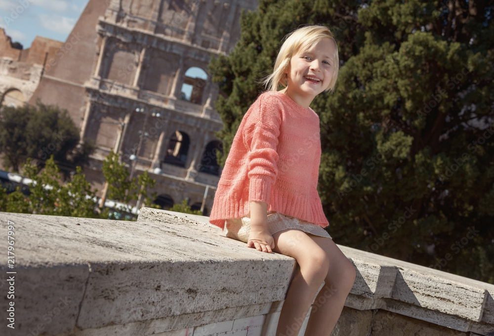 happy trendy child in Rome, Italy