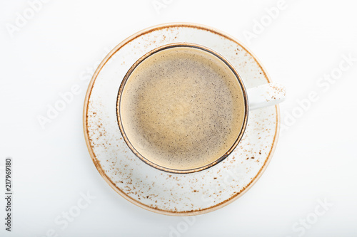 White Cup with cappuccino coffee on white wooden background. Top view with copy space. flat lay. isolated © Vasiliy